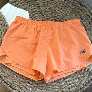 New Balance Women's Vibrant Orange Athletic Shorts